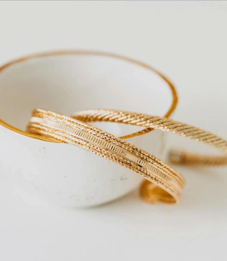 Gold bracelet repair service, jewelry sales, bangle style.