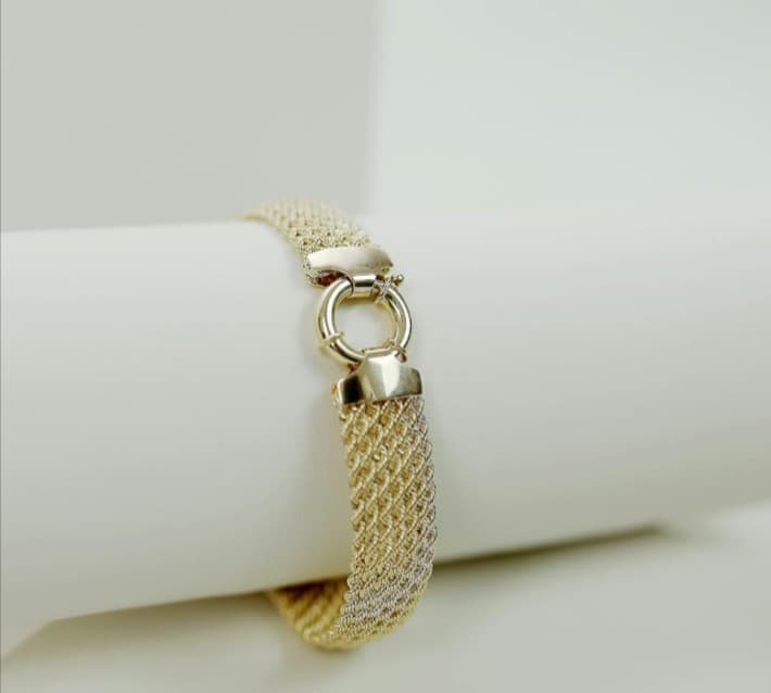 Gold mesh bracelet, jewelry sales, bracelet repair, modern design, fine jewelry.