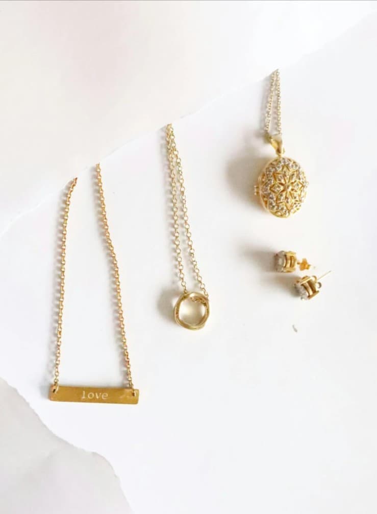 Gold necklaces, earrings and locket. Fine jewelry sales and repair.